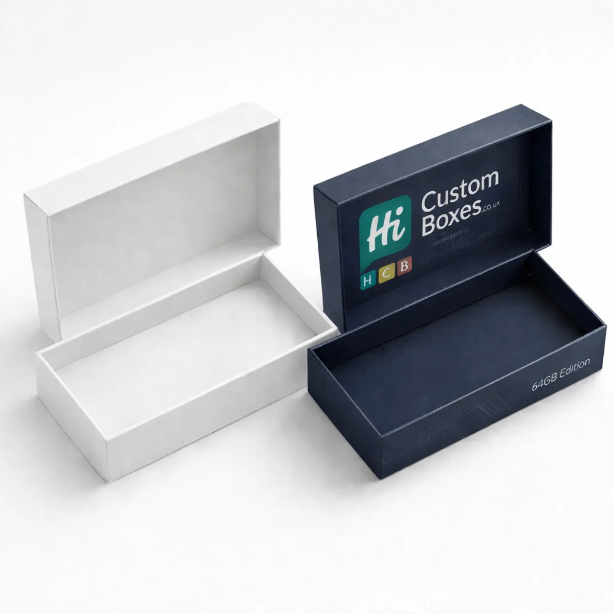 Two rectangular two-piece gift boxes shown open, including a plain white design and a navy blue branded version. class=